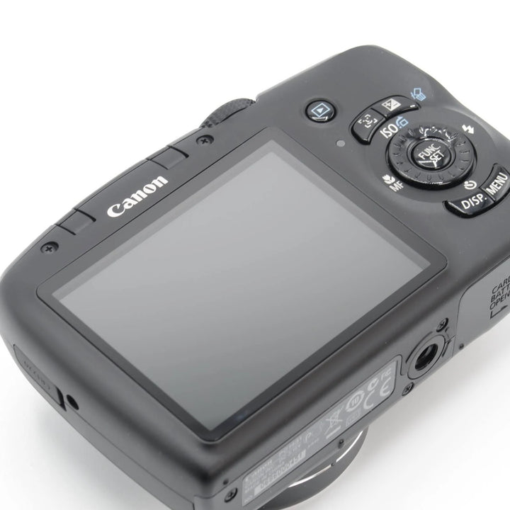 ClubCamera.com Canon PowerShot SX120 IS back panel detail with FUNC SET dial and regulatory label