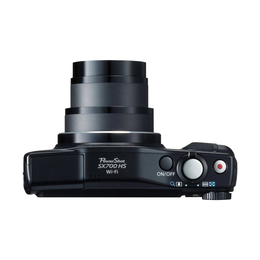 ClubCamera.com top-down view of black Canon PowerShot SX700 HS with retracted lens and power switch