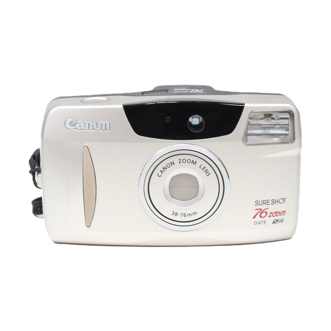 ClubCamera Canon Sure Shot 76 Zoom Date full front view silver body with braided wrist strap