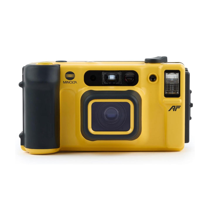 Frontal shot of vintage yellow Minolta dual-lens 35mm film camera with infrared autofocus sensor at ClubCamera.com