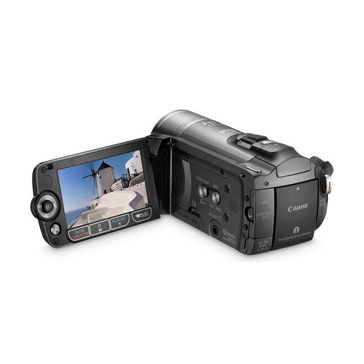 ClubCamera.com Canon VIXIA HF200 black camcorder rear view with flip-out LCD showing windmill scene and control labels