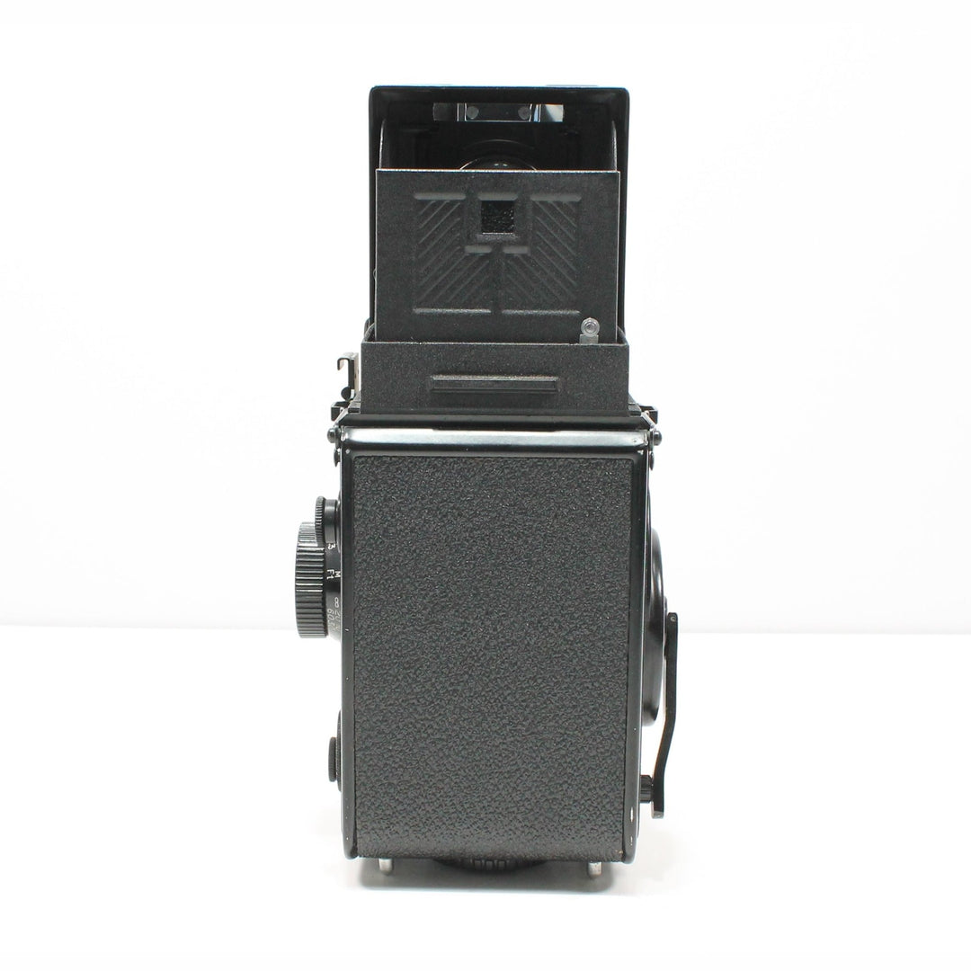 Rear texture of Yashica Mat-124G TLR film camera with advance knob and rubberized finish at ClubCamera.com