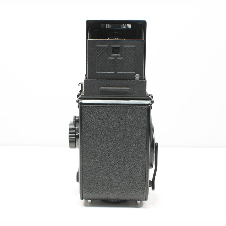 Rear texture of Yashica Mat-124G TLR film camera with advance knob and rubberized finish at ClubCamera.com